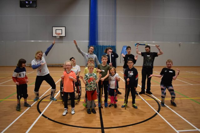 Hockey group pose in sports hall