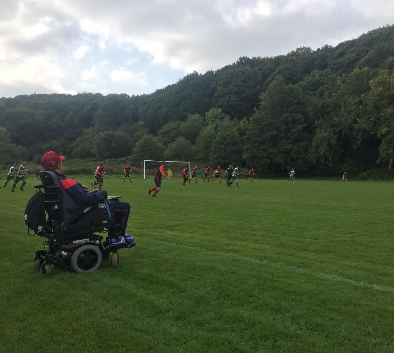 Alexander Giles in action coaching his powerchair football team