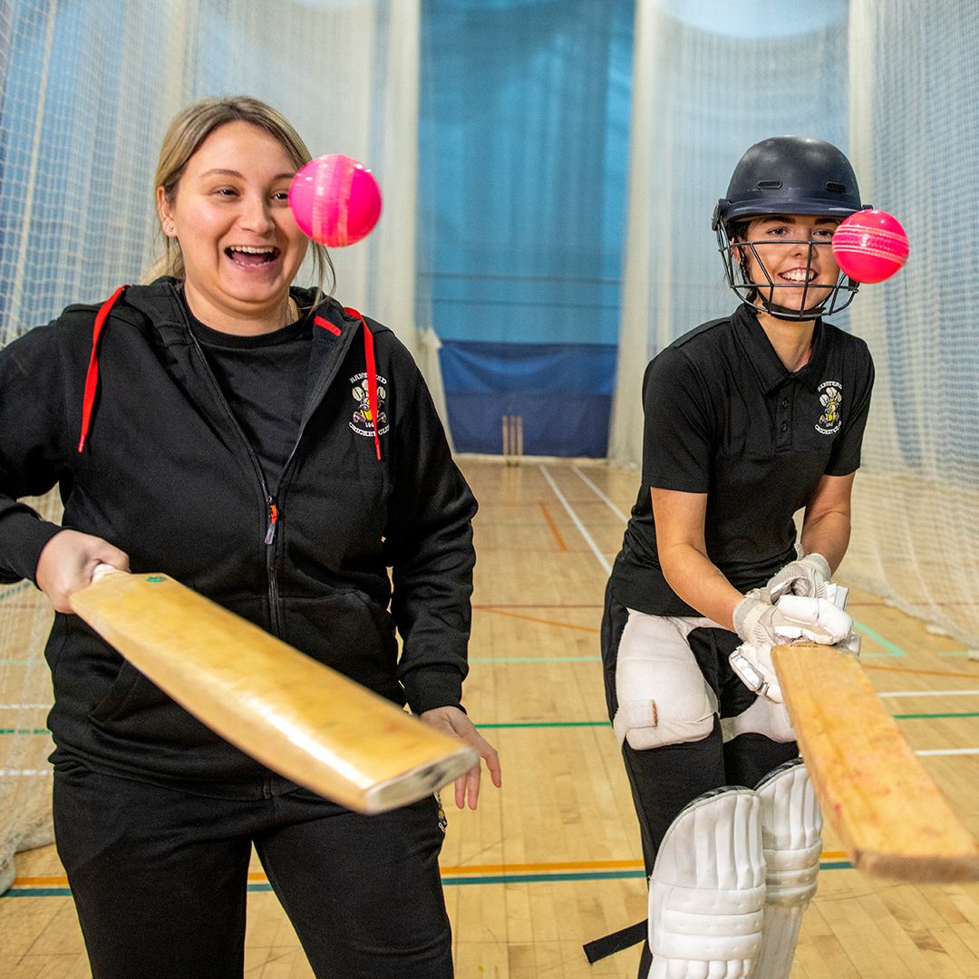 Cara and young player test their batting skills