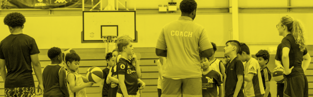 Basketball group are talking to their coach